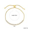 Elegante gouden armband met edelstenen