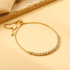 Elegante gouden armband met edelstenen