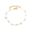 Elegante gouden armband met edelstenen