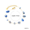 Elegante gouden armband met edelstenen