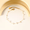 Elegante gouden armband met edelstenen