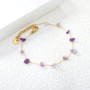 Elegante gouden armband met edelstenen
