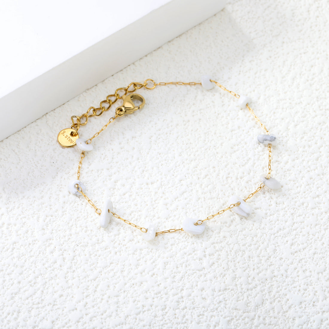 Elegant Gold Bracelet with Gemstones